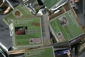 Various products offered by the Green Cross, tea, hot chocolate, cookies and candies, made with medical marijuana. (Photo by Maria J. Avila)